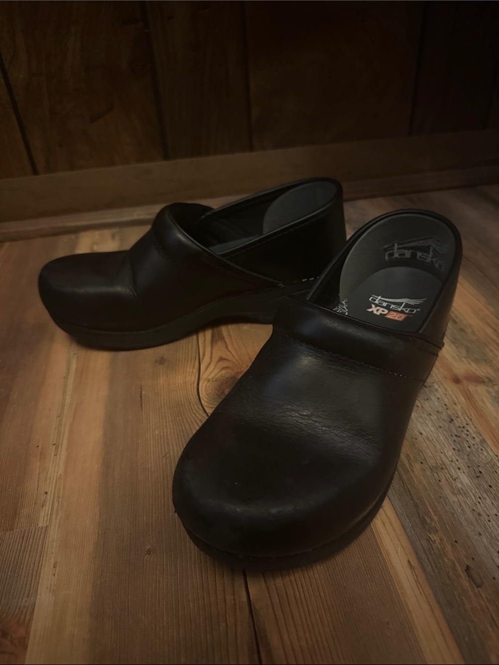 Dansko Black Leather Slip-On Clogs
